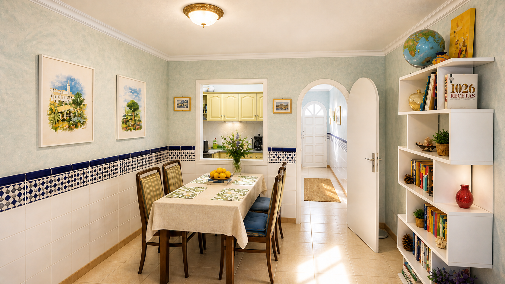 Dining area in the Family Apartment with a view towards the kitchen and hallway